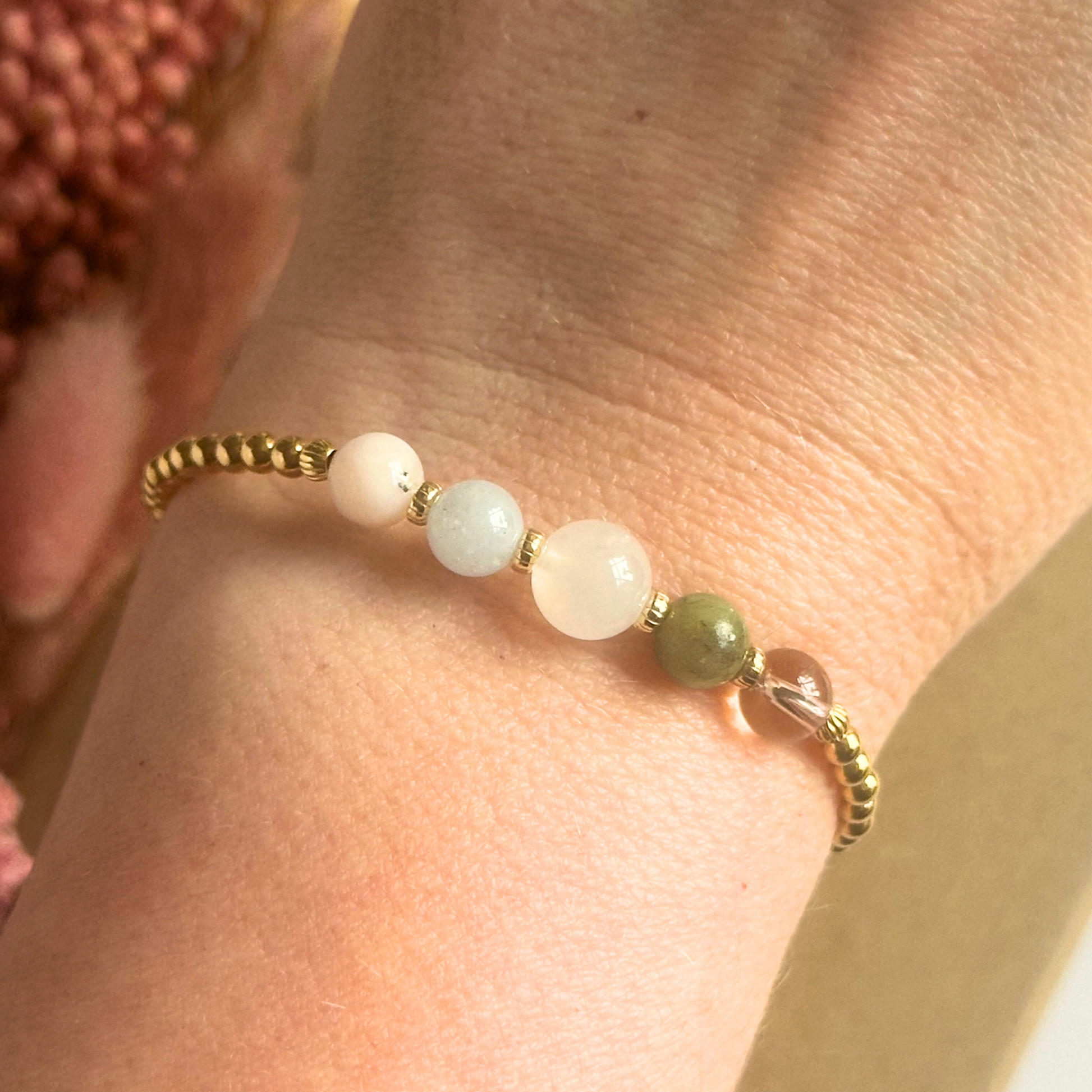This gold vermeil Virgo bracelet is made with a selection of five healing crystals all believed to resonate with the Virgo zodiac sign. The central bead is 8mm, the other four are 6mm. On an elasticated band of 3mm gold vermeil beads with corrugated accent beads. Featuring amazonite, carnelian, moonstone, moss agate and sardonyx.