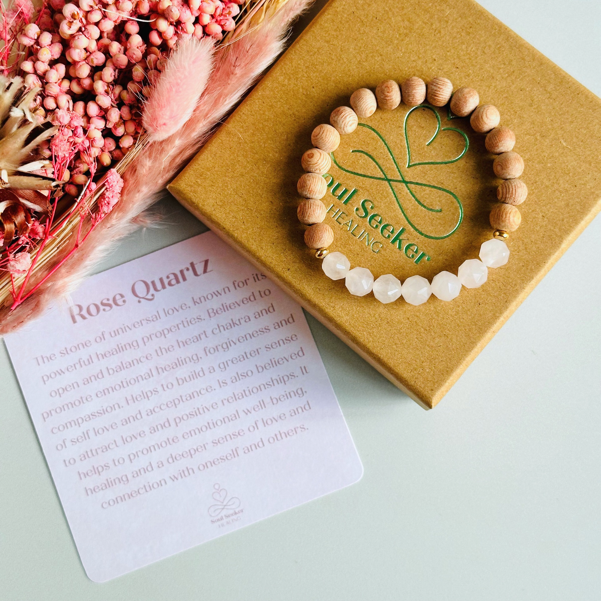 Rose quartz and raw rosewood elasticated essential oil diffuser bracelet. Made with 8mm star cut rose quartz beads, 8mm round raw rosewood beads and your choice of sterling silver, gold vermeil or rose gold vermeil spacer beads