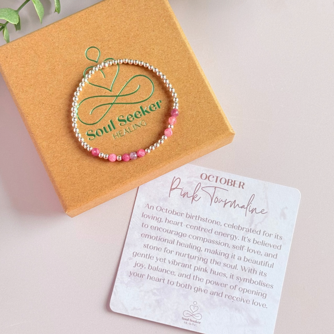 Morse code secret message bracelet spelling out your chosen name in sterling silver and pink tourmaline crystal beads. Elasticated with 4mm faceted pink tourmaline beads and 3mm sterling silver beads. Custom October birthstone bracelet.
