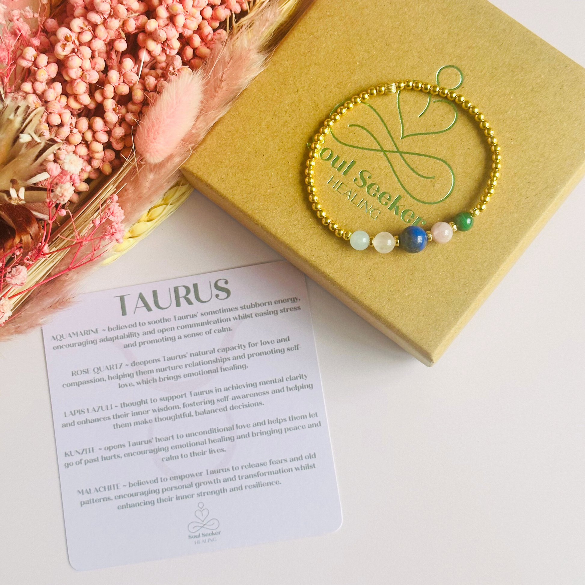 This gold vermeil Taurus bracelet is made with a selection of five healing crystals all believed to resonate with the Taurus zodiac sign. The central bead is 8mm, the other four are 6mm. On an elasticated band of 3mm gold vermeil beads with corrugated accent beads. Featuring malachite, lapis lazuli, rose quartz, kunzite and aquamarine.
