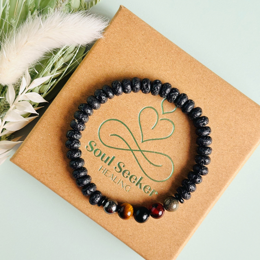 Mens crystal bracelet made with black lava beads and 8mm hematite, sardonyx, tigers eye, black obsidian and pyrite beads. All crystals are believed to be great crystals for men and make a great gift for him. Bracelet for men.
