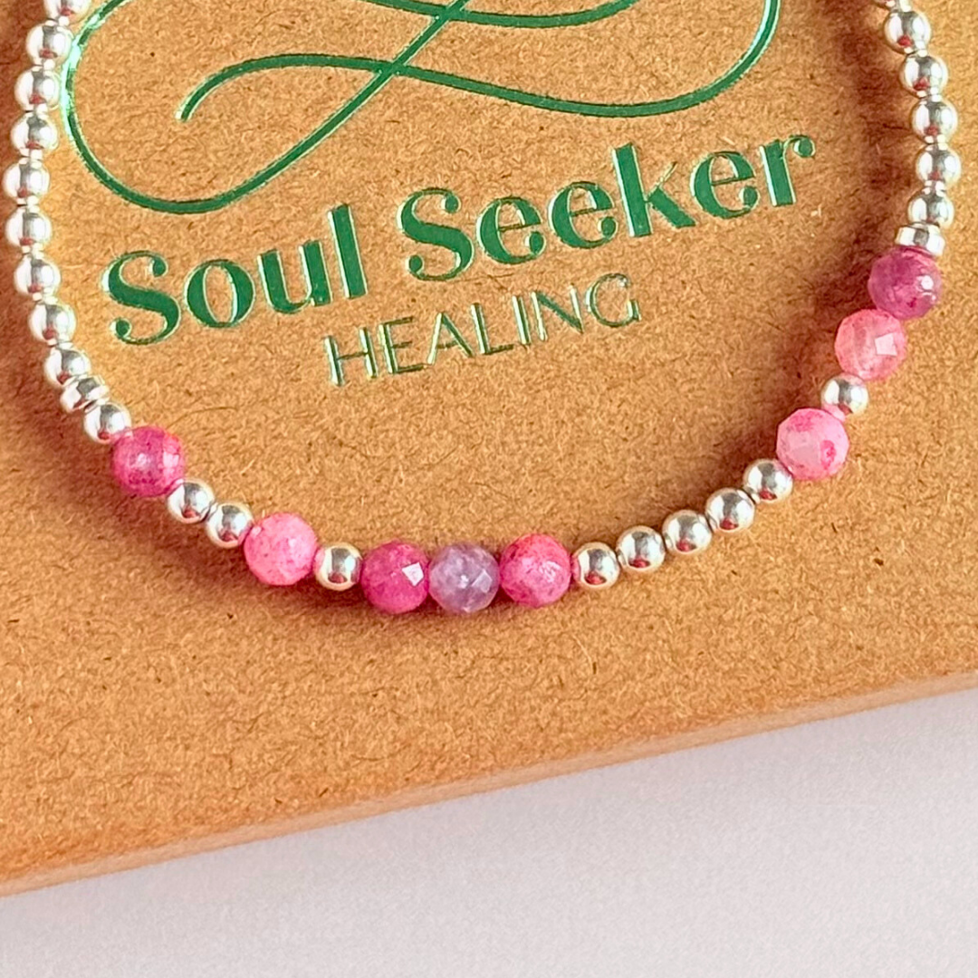 Morse code secret message bracelet spelling out your chosen name in sterling silver and pink tourmaline crystal beads. Elasticated with 4mm faceted pink tourmaline beads and 3mm sterling silver beads. Custom October birthstone bracelet.