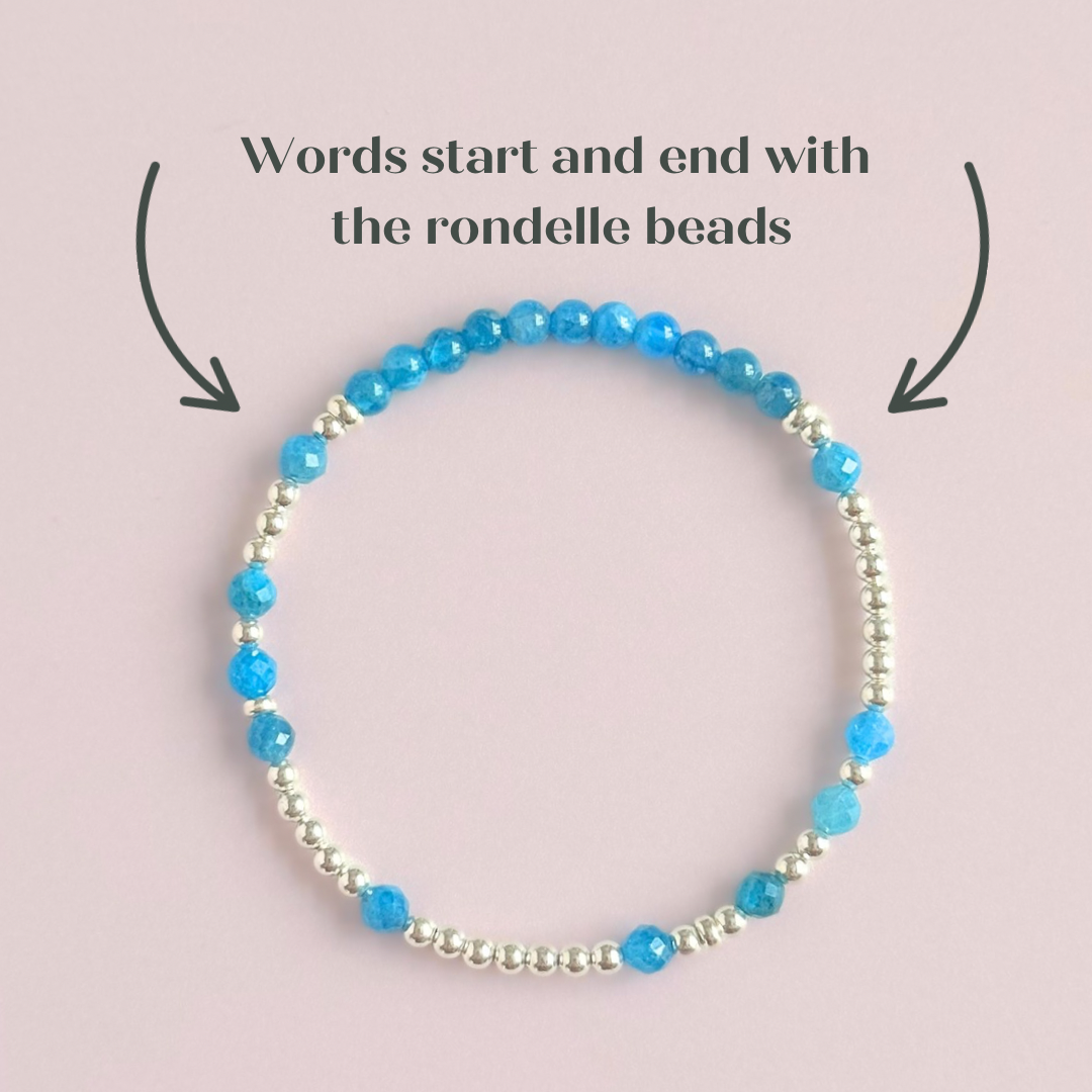 Apatite morse code bracelet that spells out the words ‘Ask, believe, receive’ in a combination of 4mm round smooth and faceted crystal beads with your choice of sterling silver or gold vermeil accent beads. Pictured in silver, from above