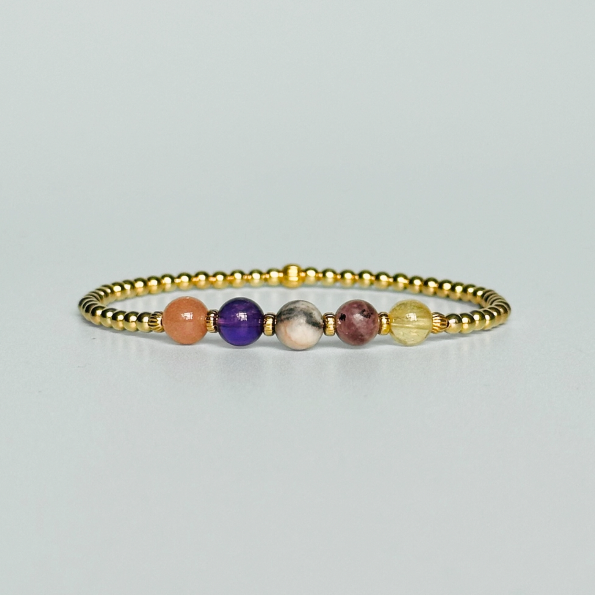 This gold vermeil menopause bracelet is made with a selection of five healing crystals all believed to help deal with menopause symptoms. The crystal beads are all 6mm and are on a band of 3mm gold vermeil beads with corrugated accent beads.