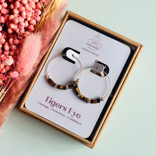 Tigers eye sterling silver hoop earrings with ethically mined tigers eye heishi beads on 25mm sterling silver hoops.