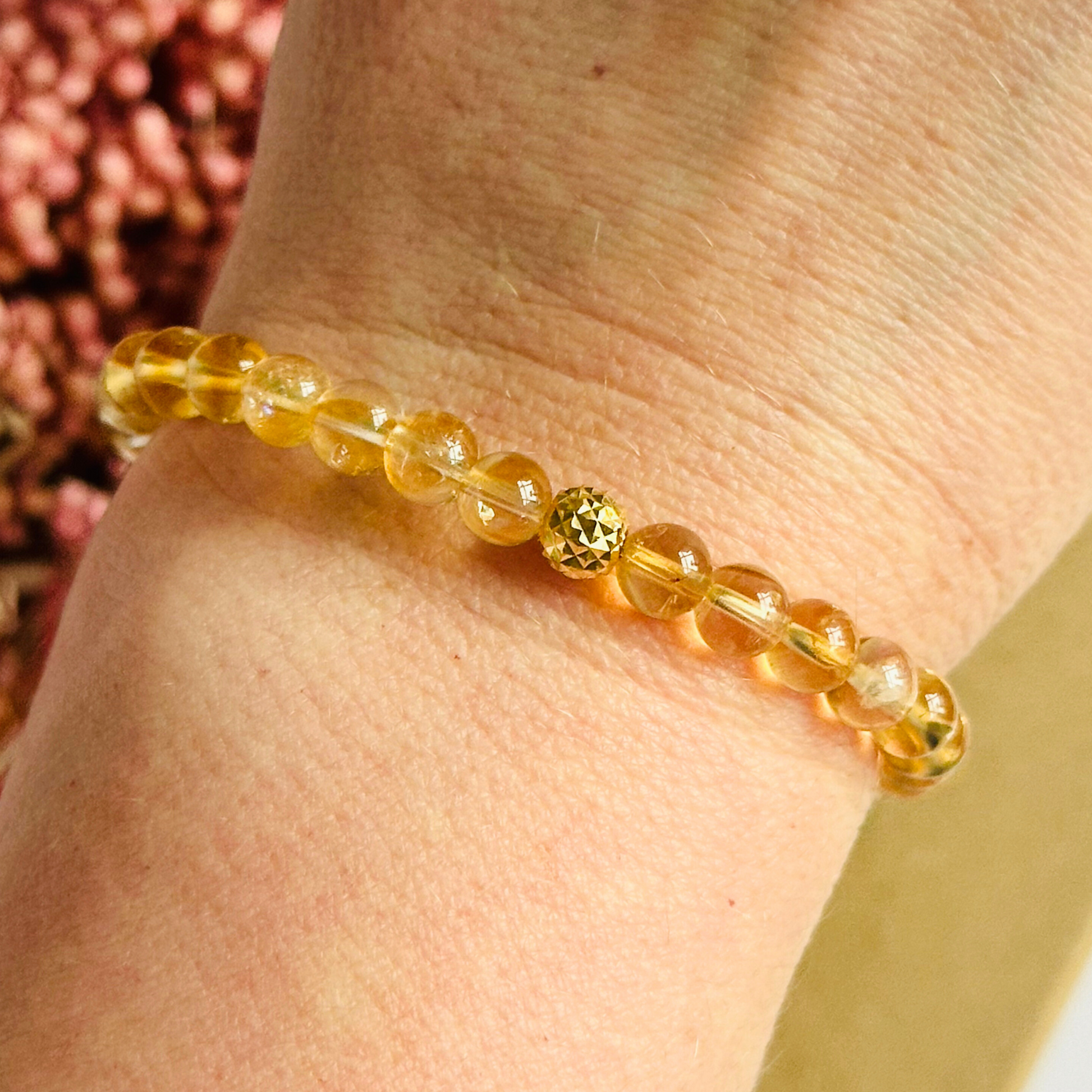 Citrine bracelet with a faceted sterling silver or gold vermeil focal bead. A bracelet to promote abundance and joy. Made with 6mm beads.