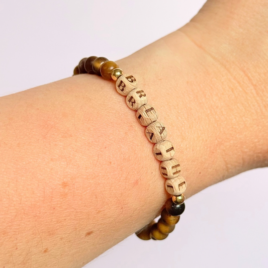 Breathwork bracelet featuring 6mm and 8mm frosted tigers eye crystal beads that follow the 4-7-8 counted breathing method. Also featuring laser engraved wooden letter beads spelling out the word BREATHE. Choose your accent beads from rose gold vermeil, gold vermeil or sterling silver.