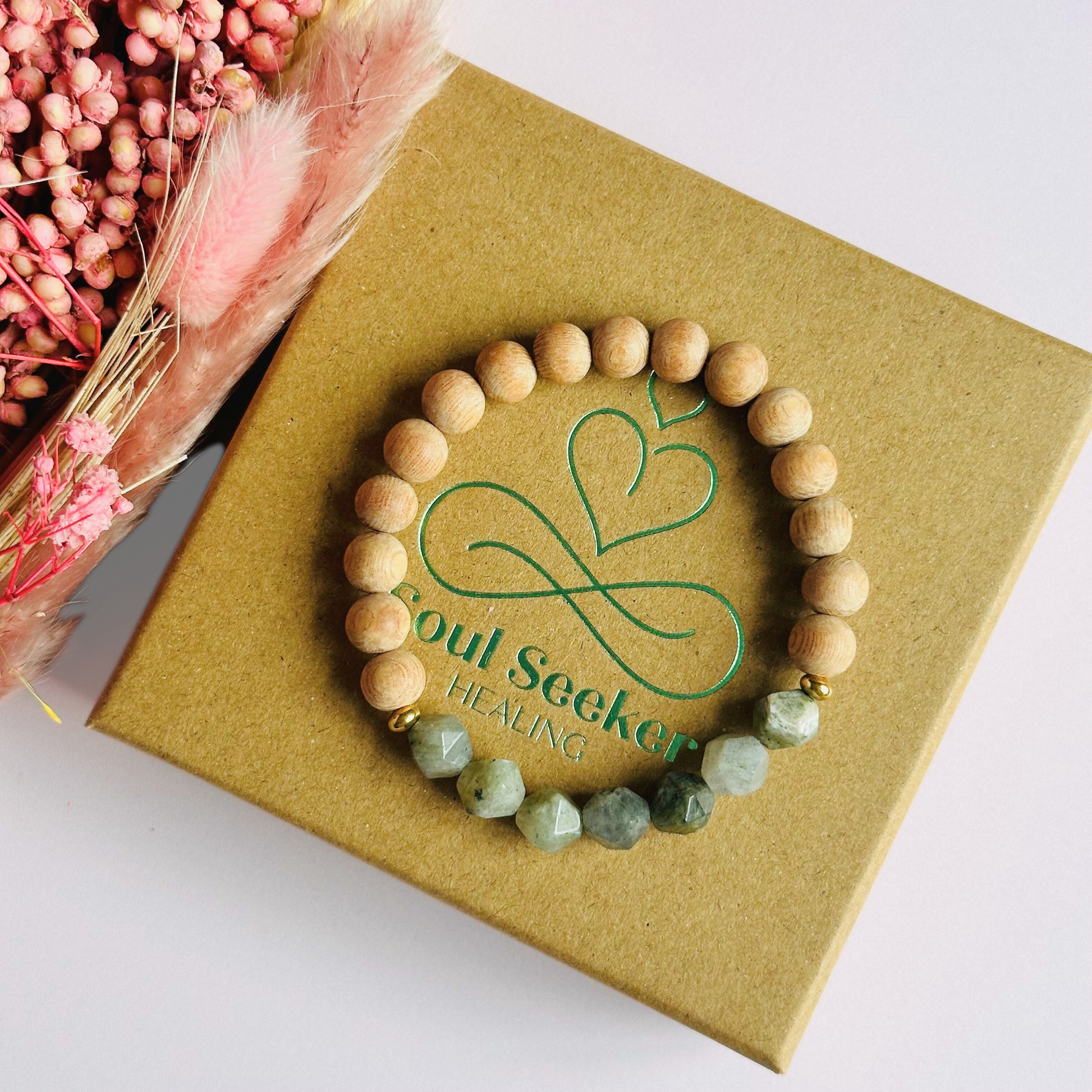 Labradorite and raw rosewood elasticated essential oil diffuser bracelet. Made with 8mm star cut labradorite beads, 8mm round raw rosewood beads and your choice of sterling silver, gold vermeil or rose gold vermeil spacer beads