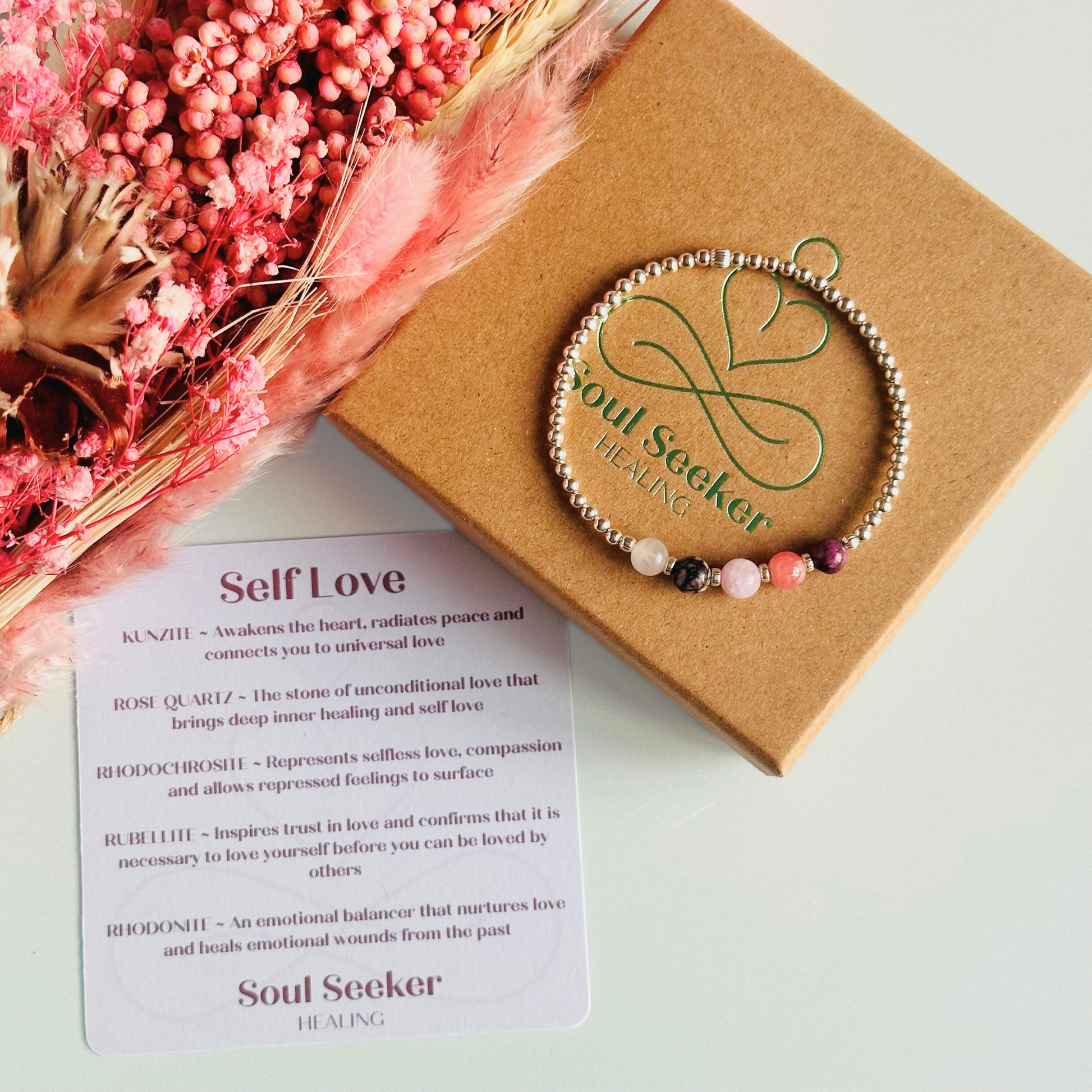 This sterling silver self love bracelet is made with a selection of five healing crystals all believed to help in achieving self love. The crystal beads are all 6mm and are on a band of 3mm sterling silver beads with corrugated accent beads.