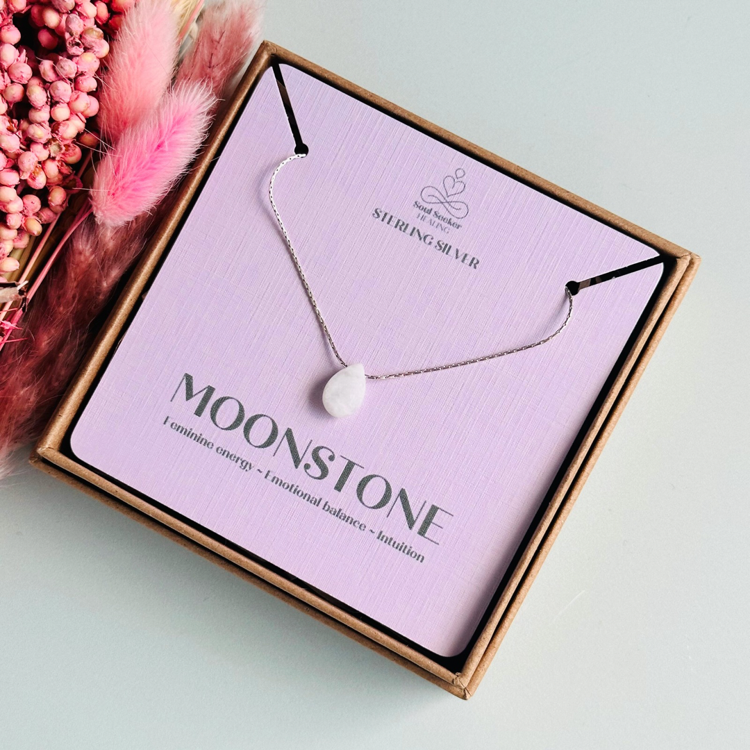 Dainty moonstone teardrop necklace featuring a 12x8mm faceted moonstone teardrop bead on a fine sterling silver cardano beading chain.