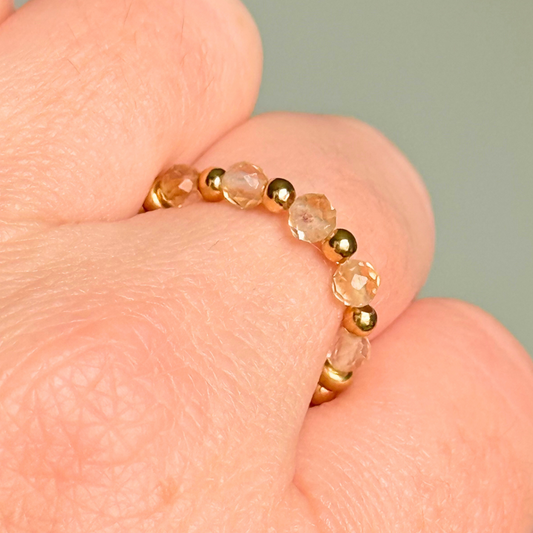 Gold vermeil and citrine crystal ring. Made with 2.5mm gold vermeil round beads and featuring five, 3mm faceted genuine citrine beads in a band style. Perfect for stacking. November birthstone jewellery