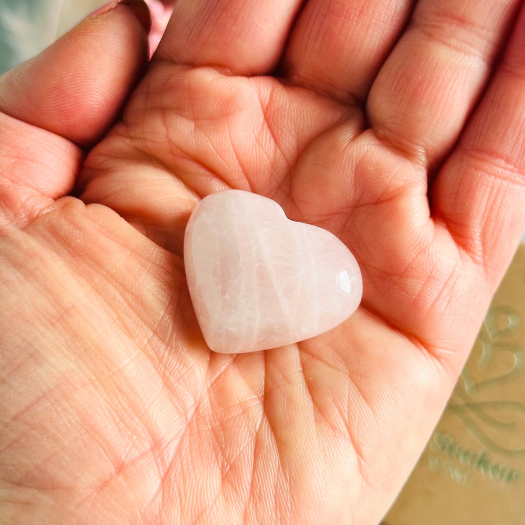 A beautiful, ethically mined rose quartz heart, presented on an eco-friendly textured card with the words ‘Your love is the heartbeat of our family. Happy Mother’s Day.’ This heart shaped rose quartz crystal measures approximately 25mm x 25mm, making it an ideal size to carry with you wherever you go or to display in your sacred space. A cotton bag is included to keep it safe.