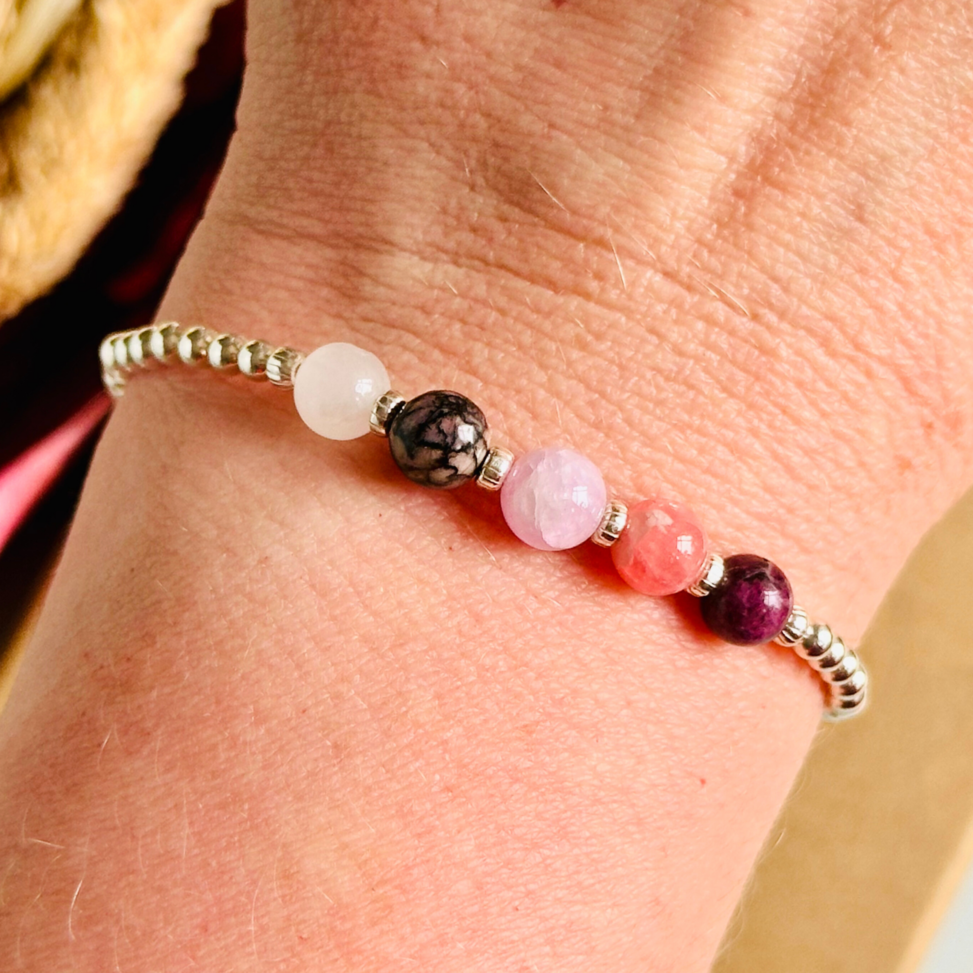 This sterling silver self love bracelet is made with a selection of five healing crystals all believed to help in achieving self love. The crystal beads are all 6mm and are on a band of 3mm sterling silver beads with corrugated accent beads.