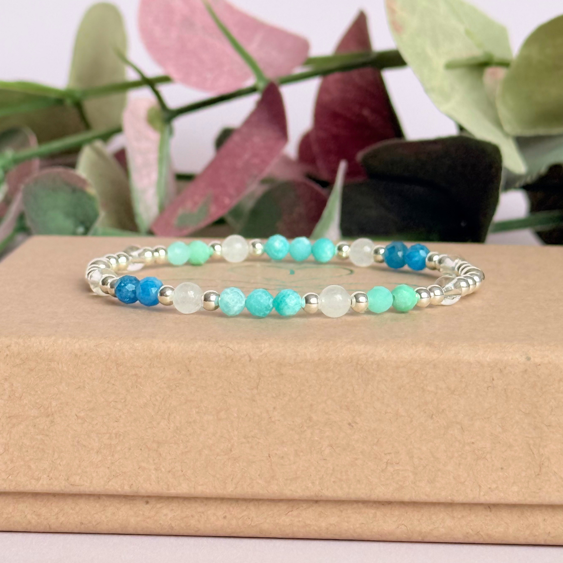 ‘Caribbean Dream' sterling silver dainty beaded bracelet with white jade, chrysoprase, amazonite, apatite and clear quartz. Made with round 3mm sterling silver beads and 4mm smooth and faceted round crystal gemstone beads. Pictured on the gift box 