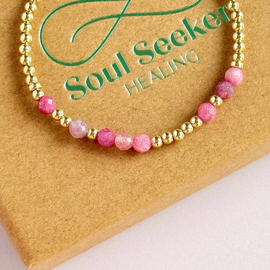 Morse code secret message bracelet spelling out your chosen name in gold filled and pink tourmaline crystal beads. Elasticated with 4mm faceted pink tourmaline beads and 3mm gold filled beads. Custom October birthstone bracelet.