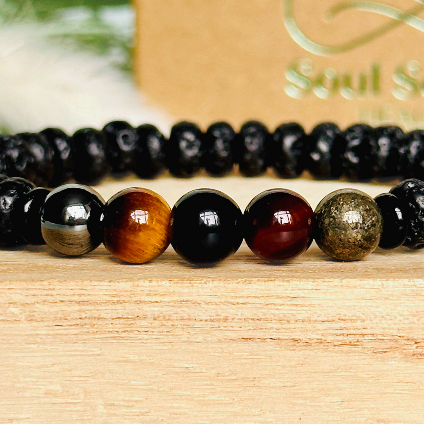 Mens crystal bracelet made with black lava beads and 8mm hematite, sardonyx, tigers eye, black obsidian and pyrite beads. All crystals are believed to be great crystals for men and make a great gift for him. Bracelet for men.