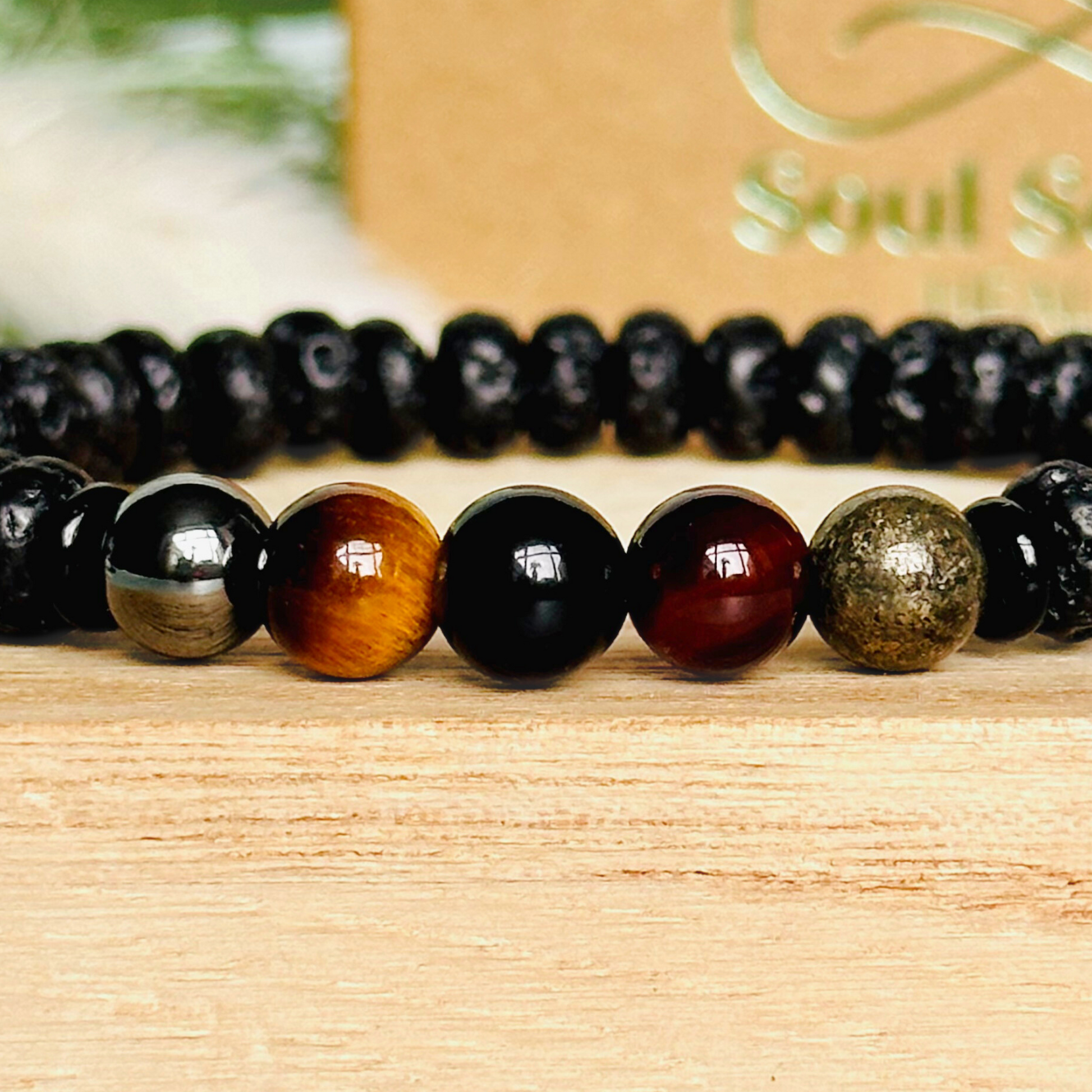 Mens crystal bracelet made with black lava beads and 8mm hematite, sardonyx, tigers eye, black obsidian and pyrite beads. All crystals are believed to be great crystals for men and make a great gift for him. Bracelet for men.