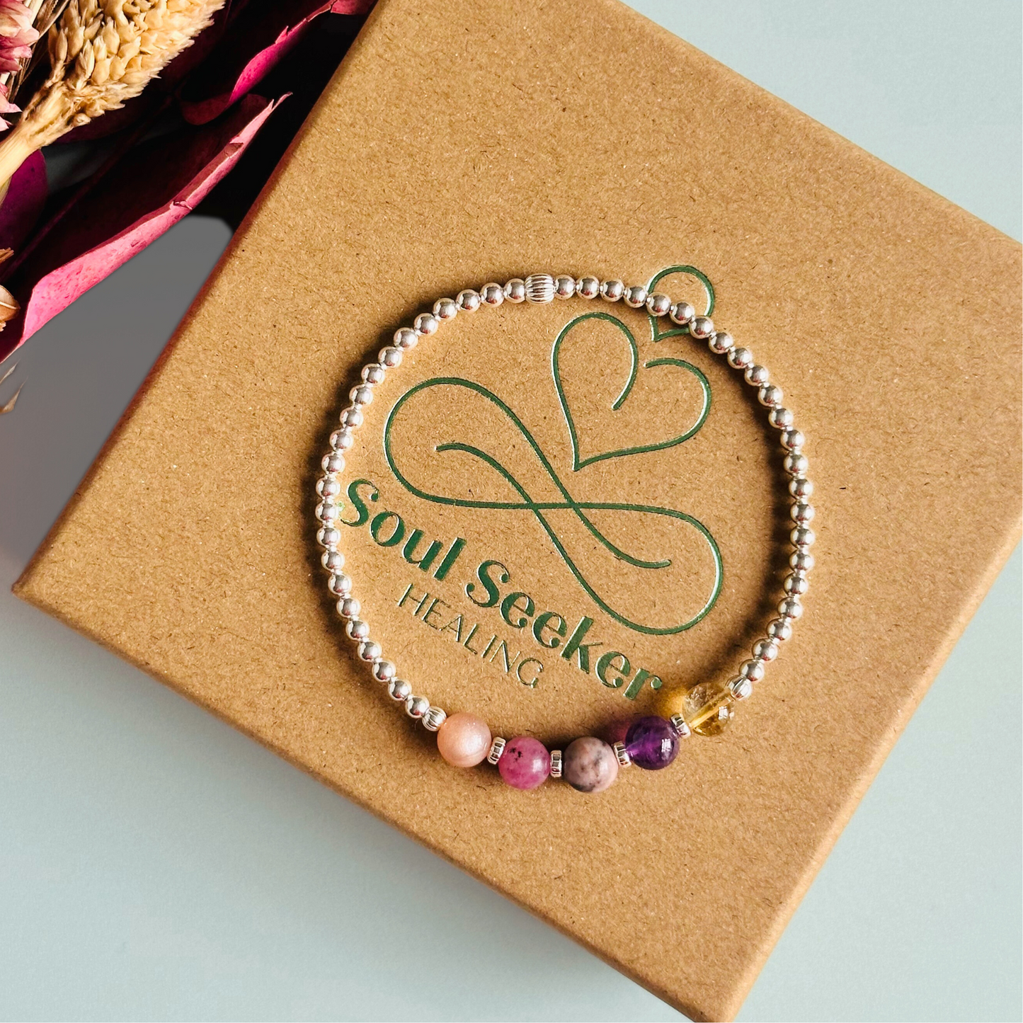 This sterling silver menopause bracelet is made with a selection of five healing crystals all believed to help with the symptoms of menopause. The crystal beads are all 6mm and are on a band of 3mm sterling silver beads with corrugated accent beads.