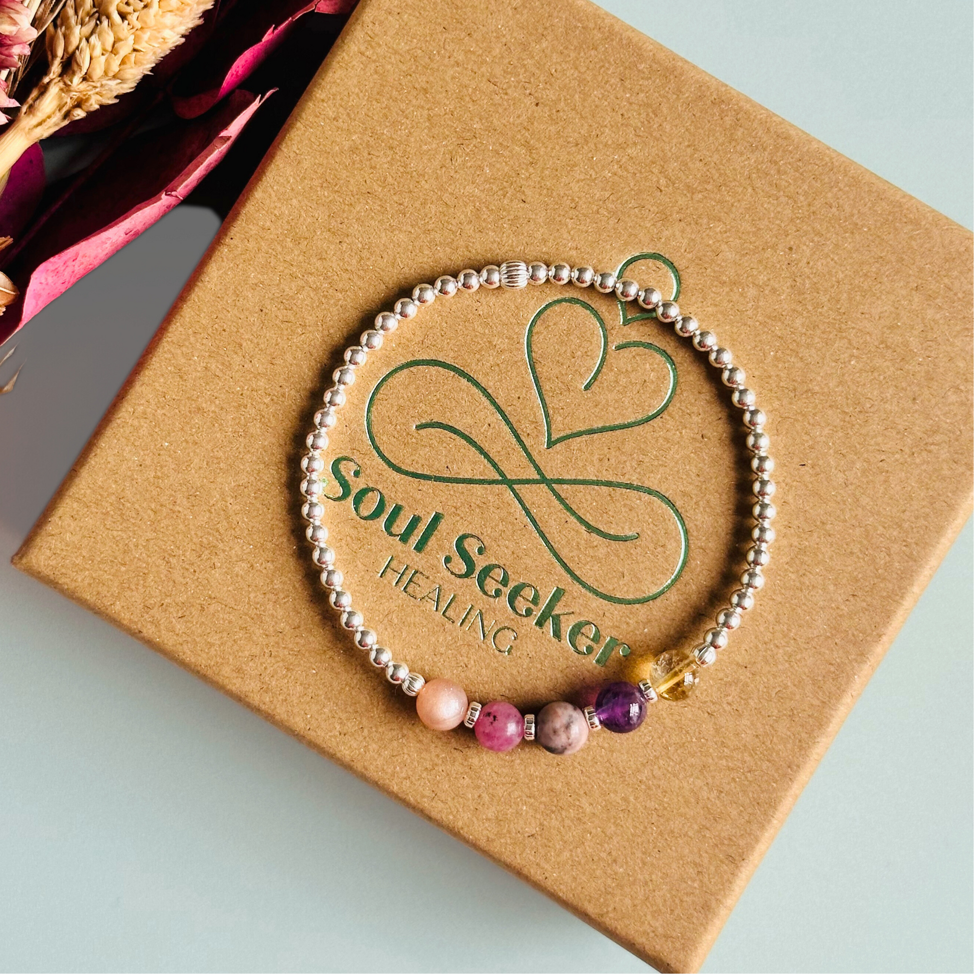 This sterling silver menopause bracelet is made with a selection of five healing crystals all believed to help with the symptoms of menopause. The crystal beads are all 6mm and are on a band of 3mm sterling silver beads with corrugated accent beads.