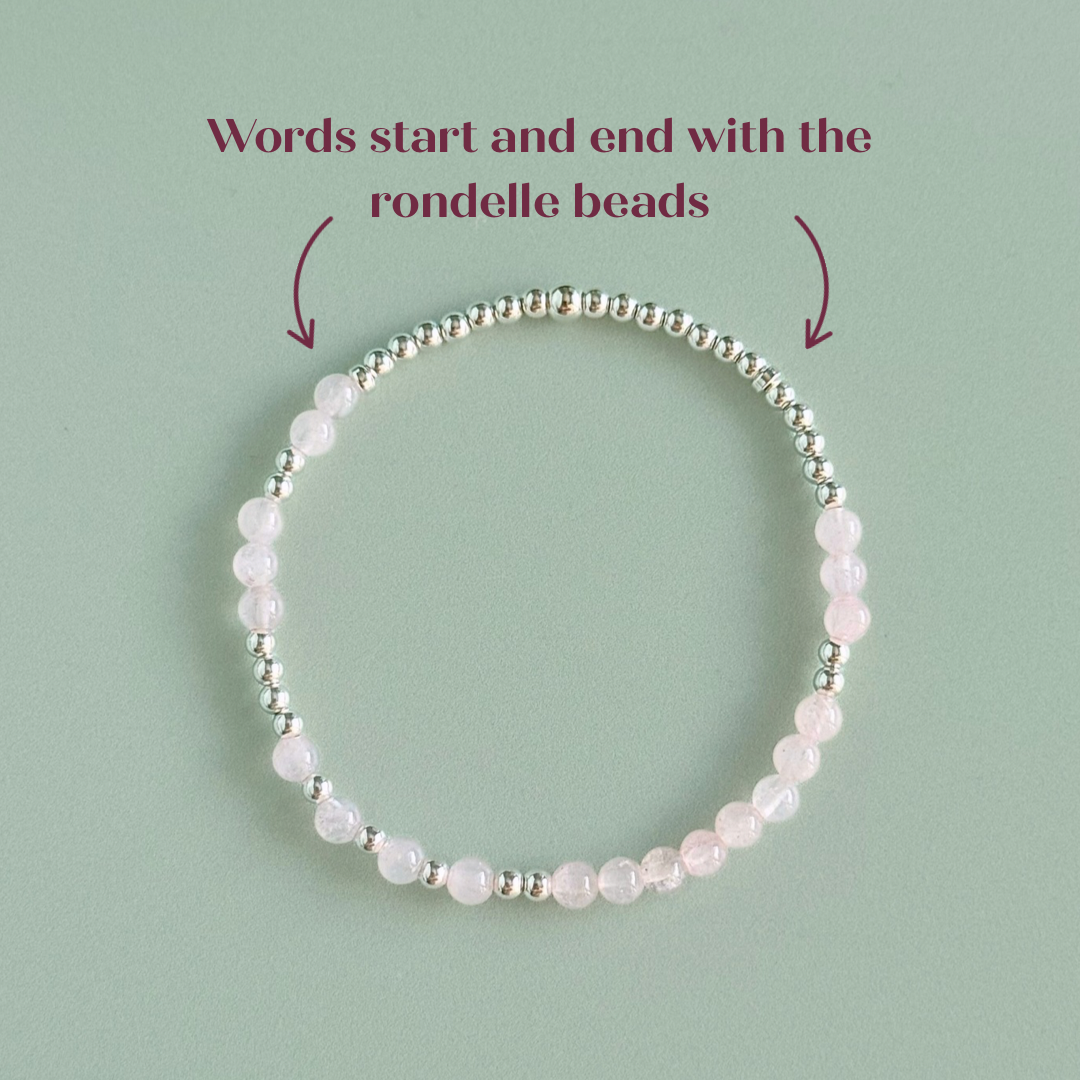 Morse code secret message bracelet spelling out the words Mum est. 2025 in sterling silver and rose quartz crystal beads. elasticated with 4mm rose quartz beads and 3mm sterling silver beads.