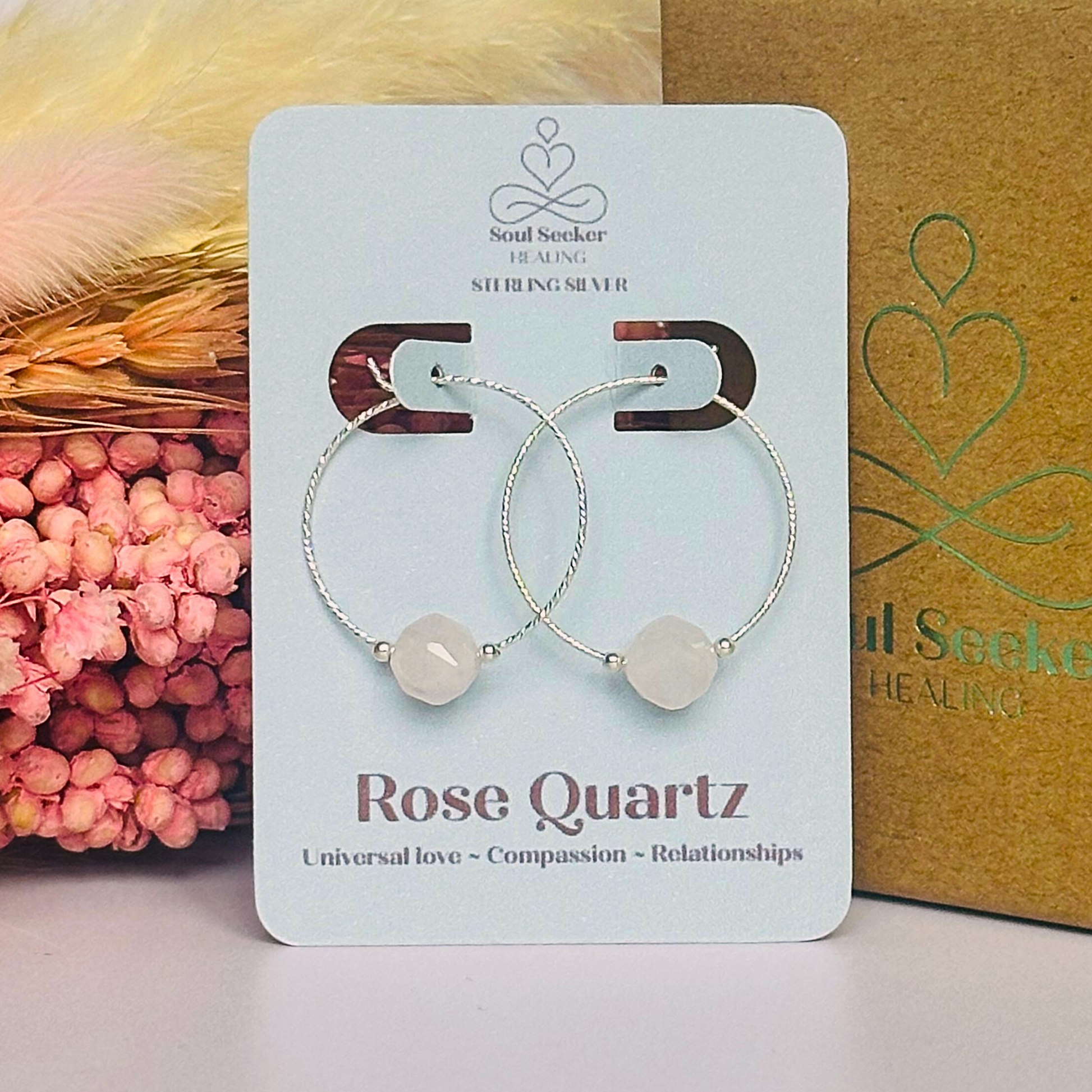 Rose Quartz sterling silver hoop earrings featuring 8mm star cut rose quartz beads on 25mm sparkle cut sterling silver hoops.