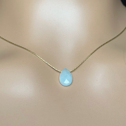 Dainty aquamarine teardrop necklace featuring a 12x8mm faceted aquamarine teardrop bead on a fine gold vermeil cardano beading chain.