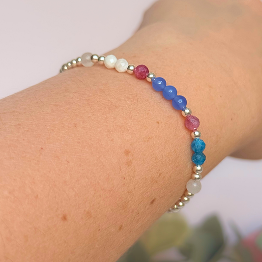 ‘Santorini' sterling silver dainty beaded bracelet with pink tourmaline, rainbow moonstone, blue agate, apatite and white jade. Made with round 3mm sterling silver beads and 4mm smooth and faceted round crystal gemstone beads. Pictured being worn