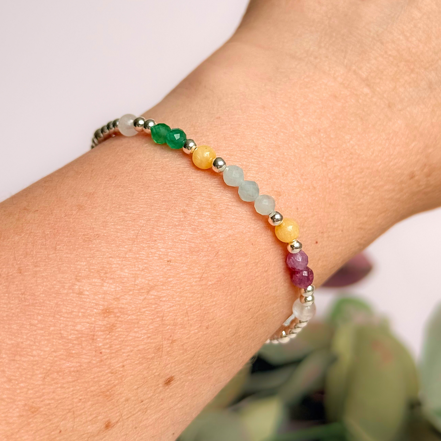 'Amalfi Coast' sterling silver dainty beaded bracelet with green agate, yellow calcite, pink tourmaline, aquamarine and moonstone. Made with round 3mm sterling silver beads and 4mm smooth and faceted round crystal gemstone beads. Pictured being worn