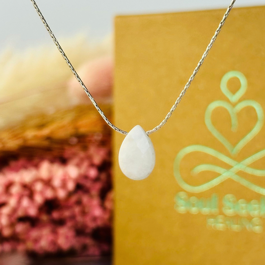 Dainty moonstone teardrop necklace featuring a 12x8mm faceted moonstone teardrop bead on a fine sterling silver cardano beading chain.