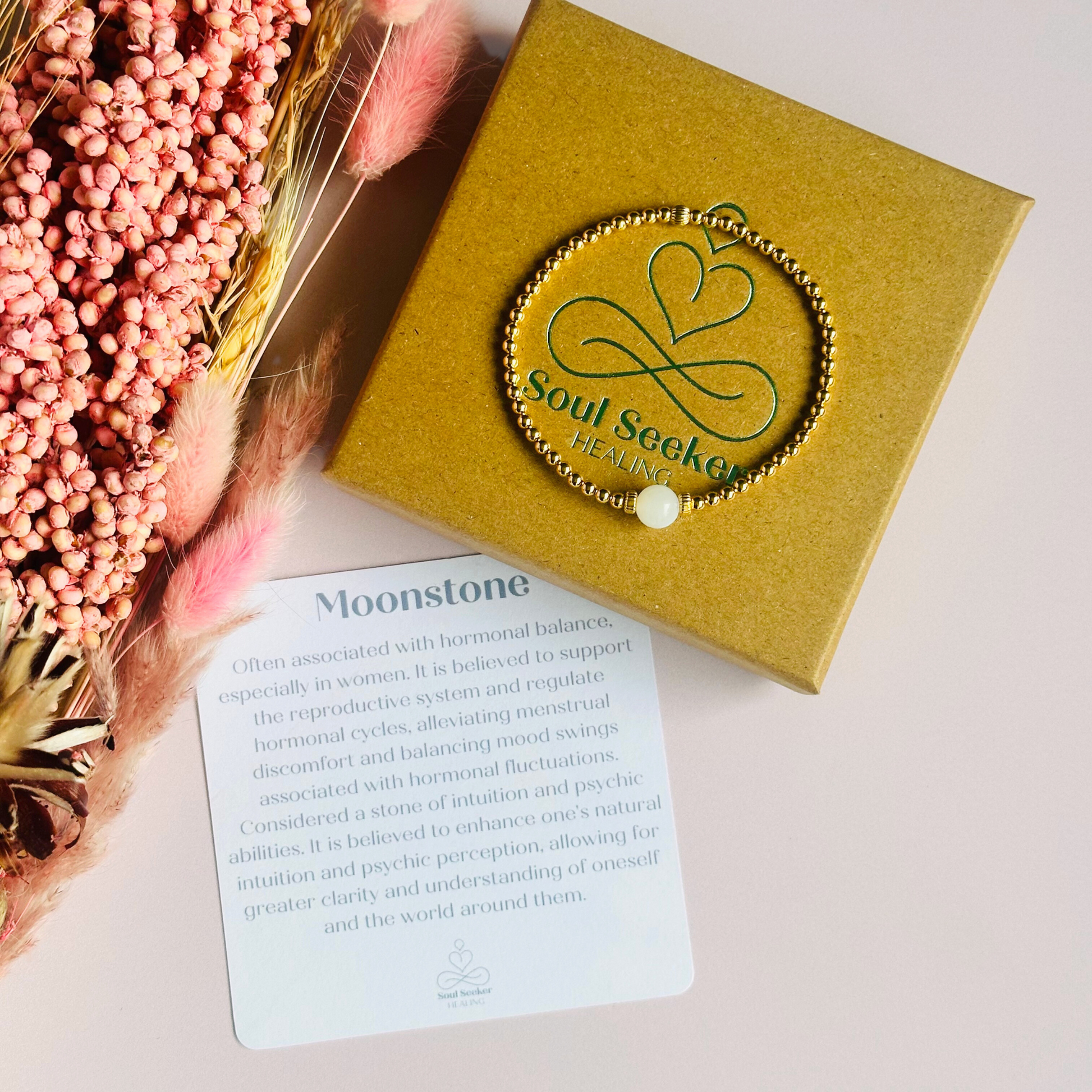 Gold vermeil moonstone bracelet features an ethically mined 8mm moonstone bead, flanked by corrugated rondelle beads on a band of 3mm gold vermeil beads. A bracelet to promote feminine energy and intuition.