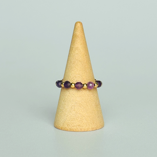 Gold vermeil amethyst ring featuring five 3mm faceted round amethyst beads on a elasticated ring band of 2.5mm gold vermeil beads. February birthstone ring.
