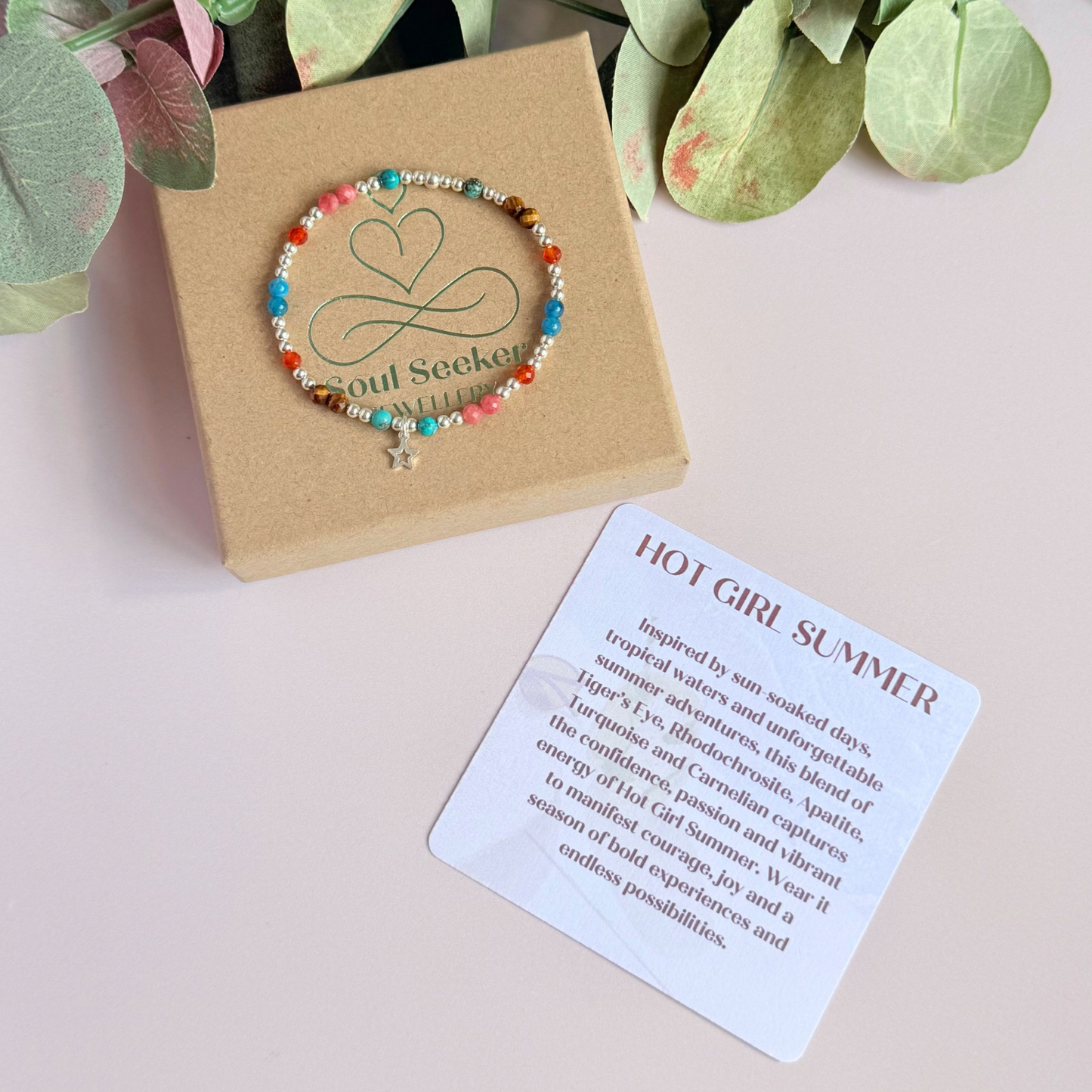 'Hot girl summer' sterling silver dainty beaded bracelet with tigers eye, turquoise, apatite, carnelian and rhodochrosite. With a beautiful open star charm. Made with round 3mm sterling silver beads and 4mm smooth and faceted round crystal gemstone beads. Pictured on top of the gift box, with the crystal information card.