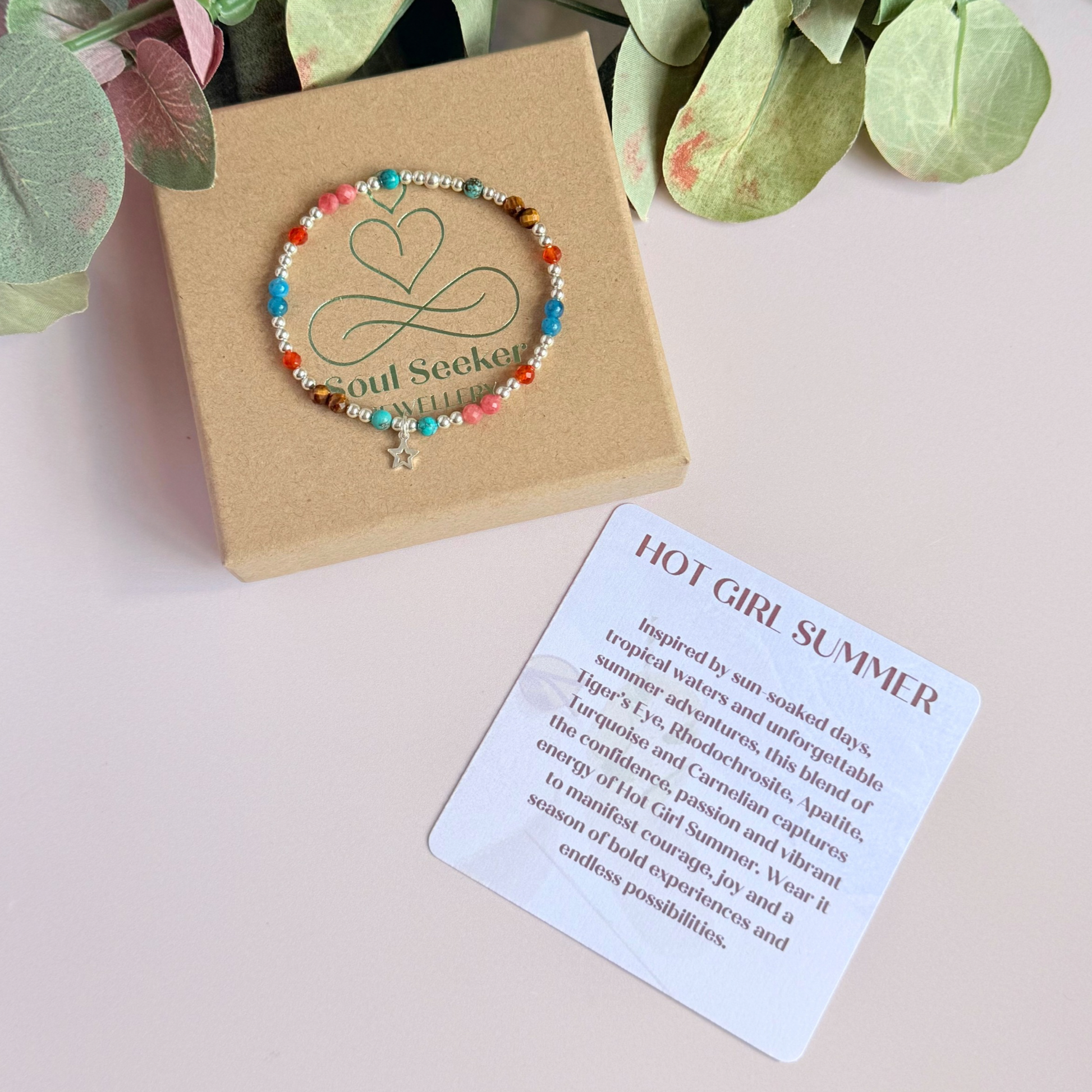 'Hot girl summer' sterling silver dainty beaded bracelet with tigers eye, turquoise, apatite, carnelian and rhodochrosite. With a beautiful open star charm. Made with round 3mm sterling silver beads and 4mm smooth and faceted round crystal gemstone beads. Pictured on top of the gift box, with the crystal information card.
