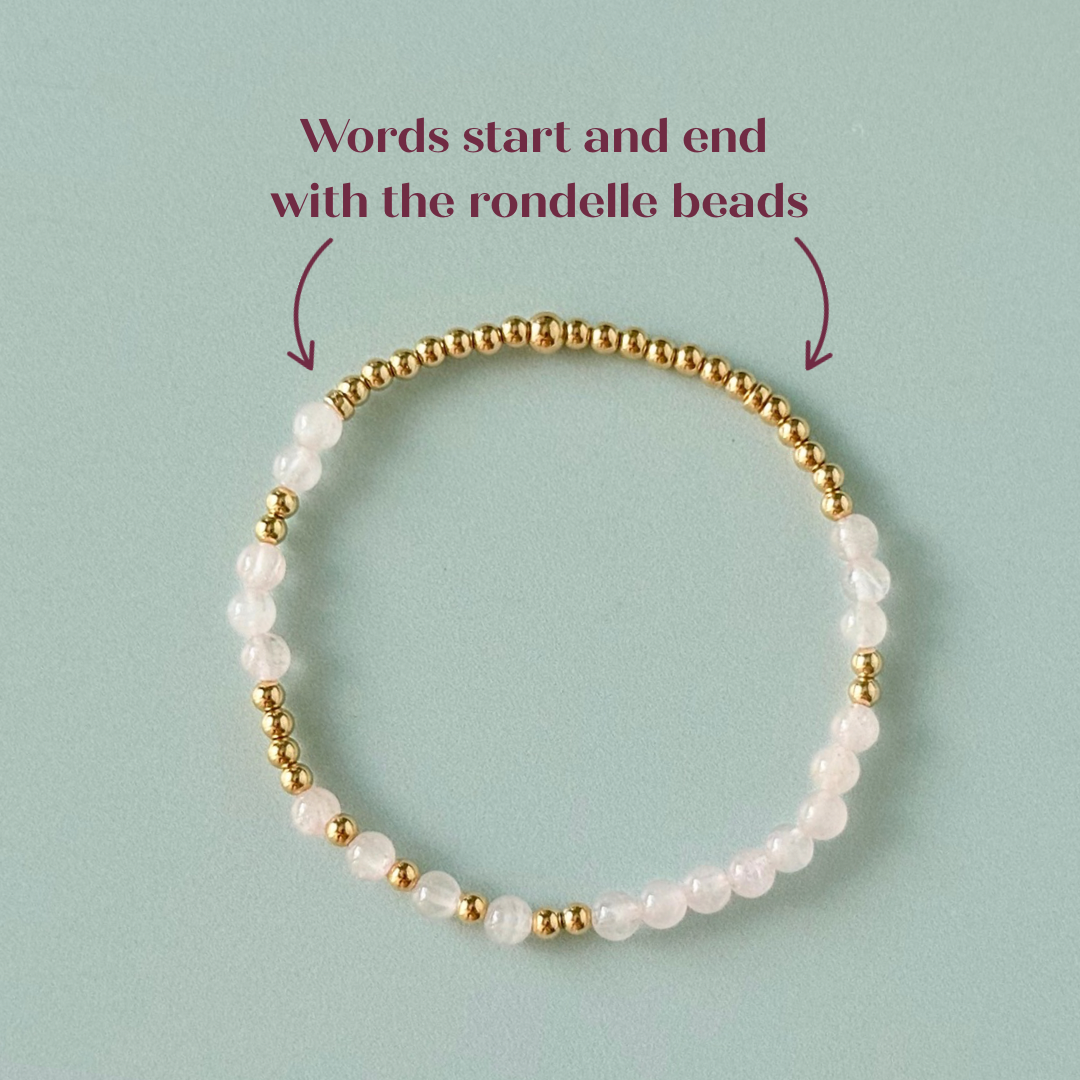 Morse code secret message bracelet spelling out the words Mum est. 2025 in gold filled and rose quartz crystal beads. elasticated with 4mm rose quartz beads and 3mm gold filled beads.