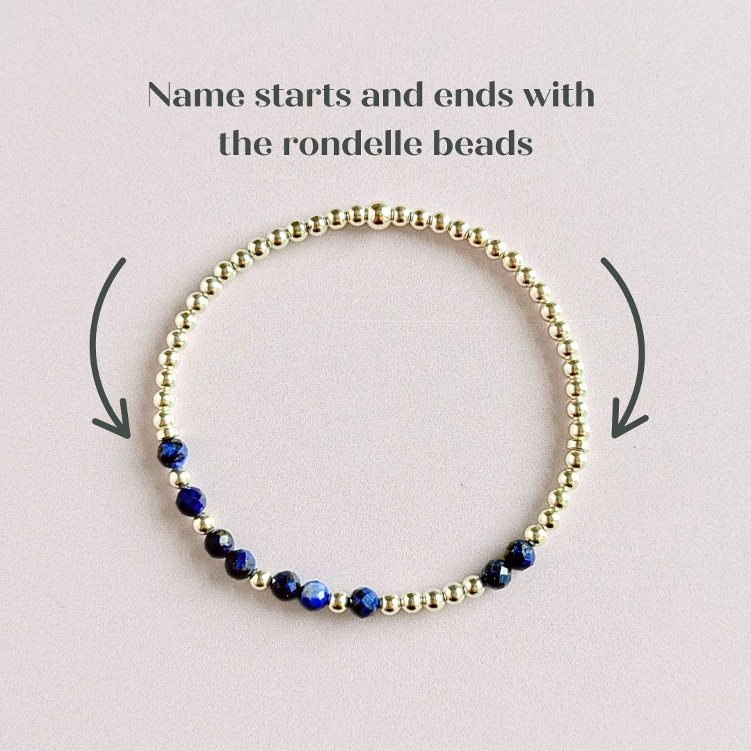 Morse code secret message bracelet spelling out your chosen name in sterling silver and lapis lazuli crystal beads. Elasticated with 4mm faceted lapis lazuli beads and 3mm sterling silver beads. Custom September birthstone bracelet.