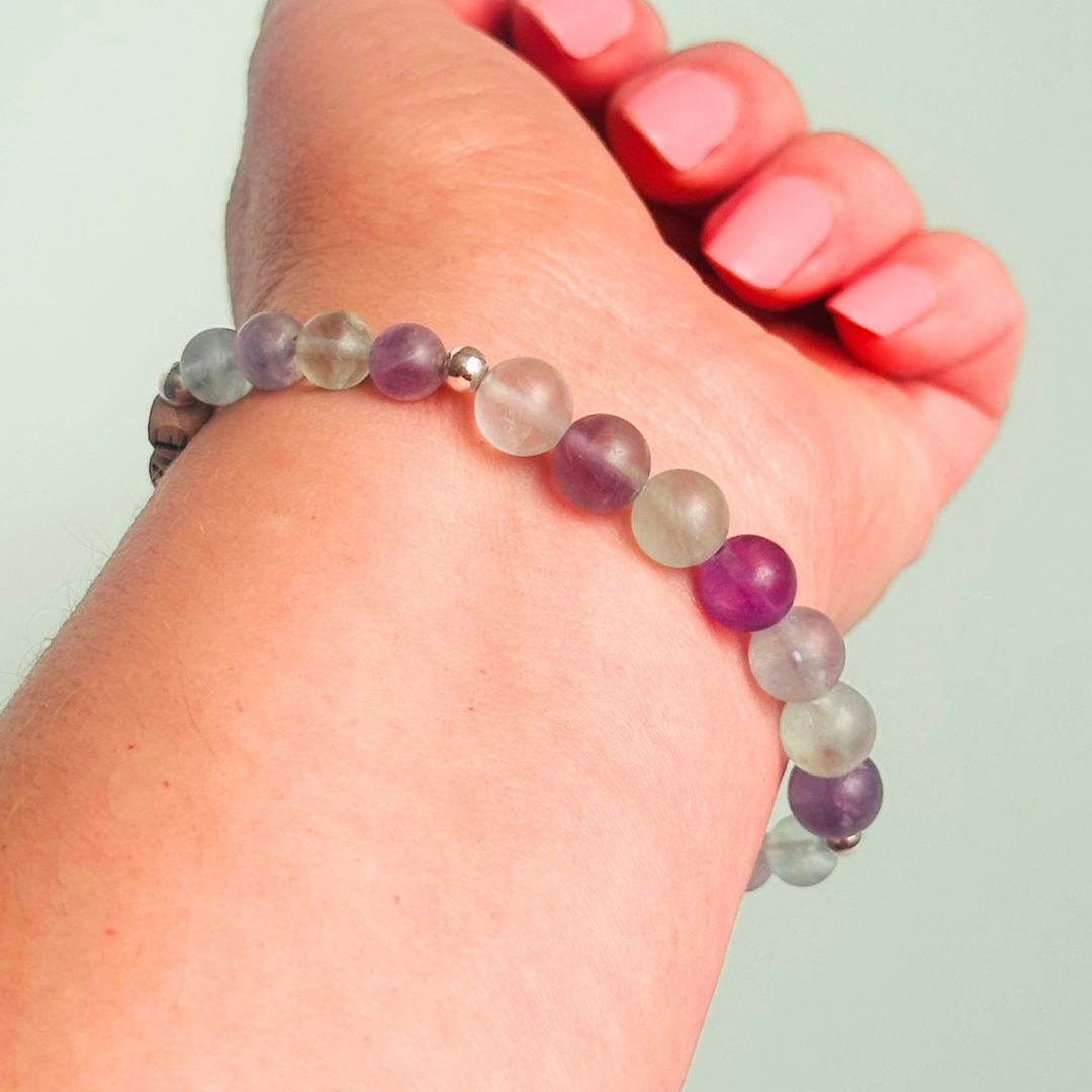 Breathwork bracelet featuring 6mm and 8mm frosted rainbow fluorite crystal beads that follow the 4-7-8 counted breathing method. Also featuring laser engraved wooden letter beads spelling out the word BREATHE. Choose your accent beads from rose gold vermeil, gold vermeil or sterling silver.