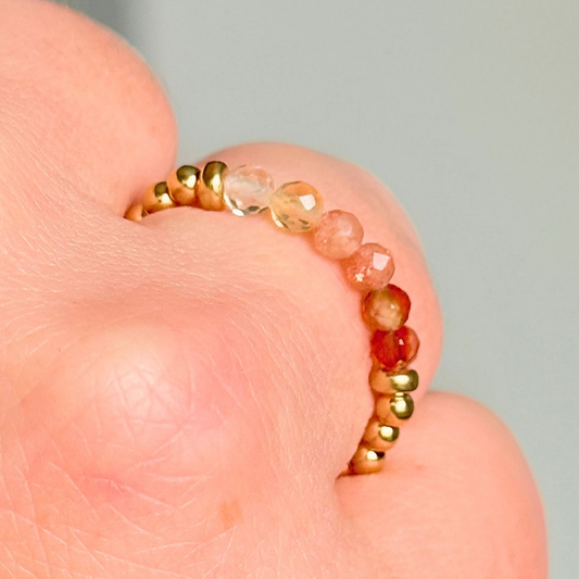 Gold vermeil band style ombré ring with multicolour gradient 3mm faceted citrine, sunstone and carnelian beads with a beaded band of 2.5 mm gold vermeil round beads. Elasticated for comfort.