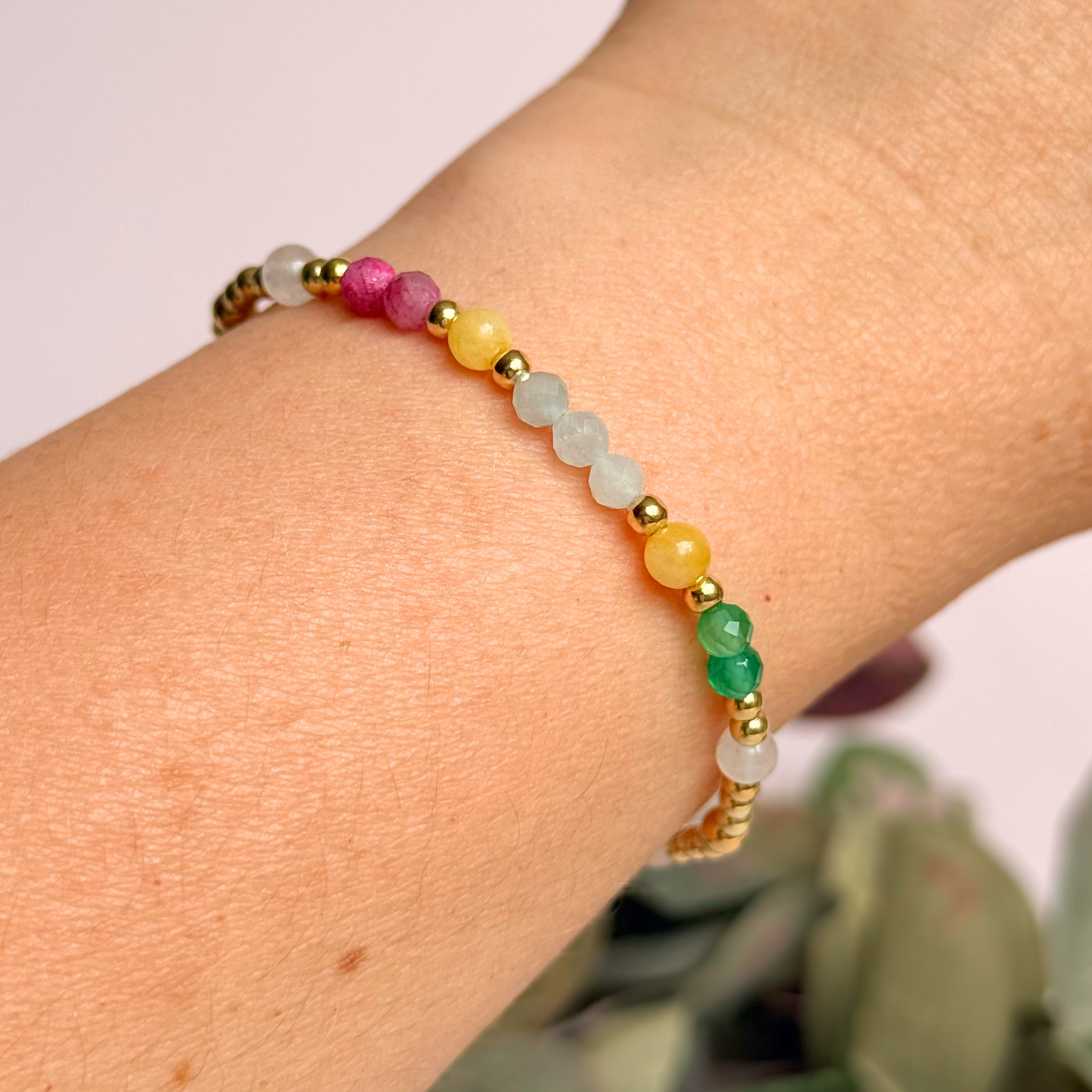 'Amalfi Coast' gold vermeil dainty beaded bracelet with green agate, yellow calcite, pink tourmaline, aquamarine and moonstone. Made with round 3mm gold vermeil beads and 4mm smooth and faceted round crystal gemstone beads. Pictured being worn