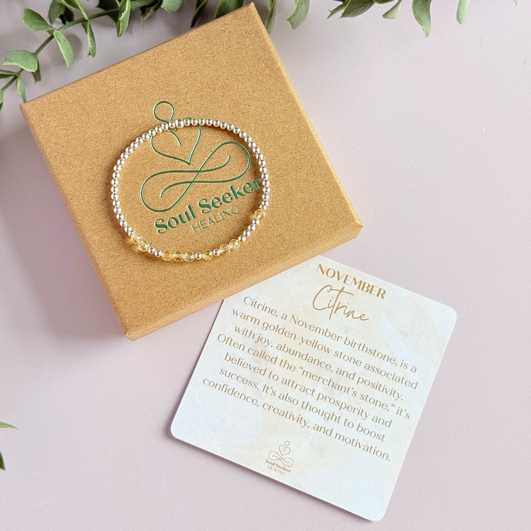 Morse code secret message bracelet spelling out your chosen name in sterling silver and citrine crystal beads. Elasticated with 4mm faceted citrine beads and 3mm sterling silver beads. Custom November birthstone bracelet.