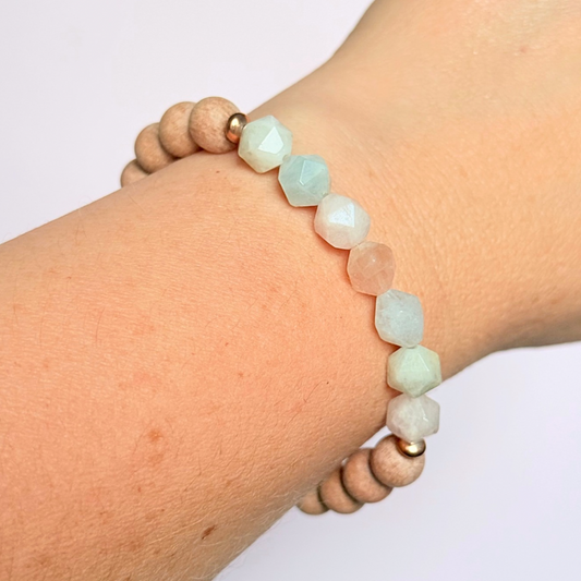 Morganite and raw rosewood elasticated essential oil diffuser bracelet. Made with 8mm star cut morganite beads, 8mm round raw rosewood beads and your choice of sterling silver, gold vermeil or rose gold vermeil spacer beads