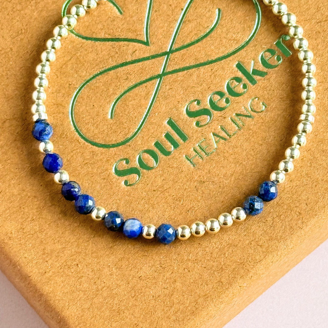 Morse code secret message bracelet spelling out your chosen name in sterling silver and lapis lazuli crystal beads. Elasticated with 4mm faceted lapis lazuli beads and 3mm sterling silver beads. Custom September birthstone bracelet.