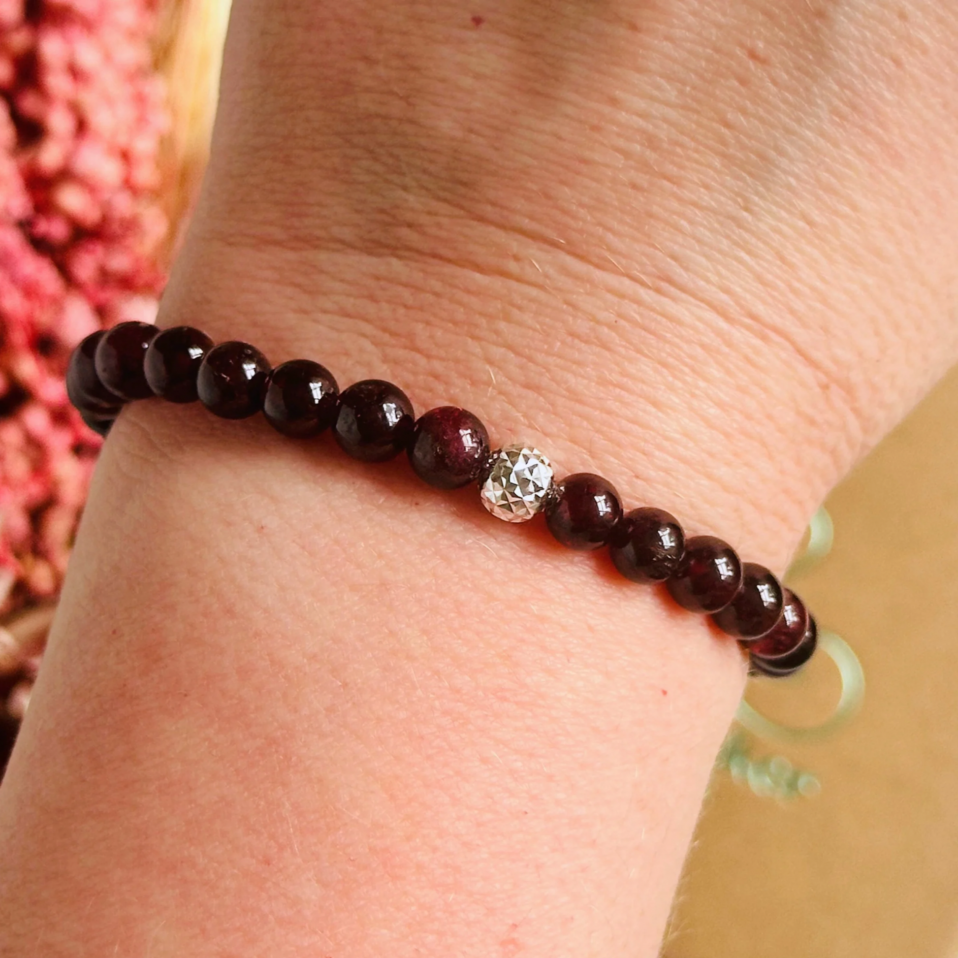 Garnet bracelet with a faceted sterling silver or gold vermeil focal bead. A bracelet for passion, success and confidence. Made with 6mm beads.