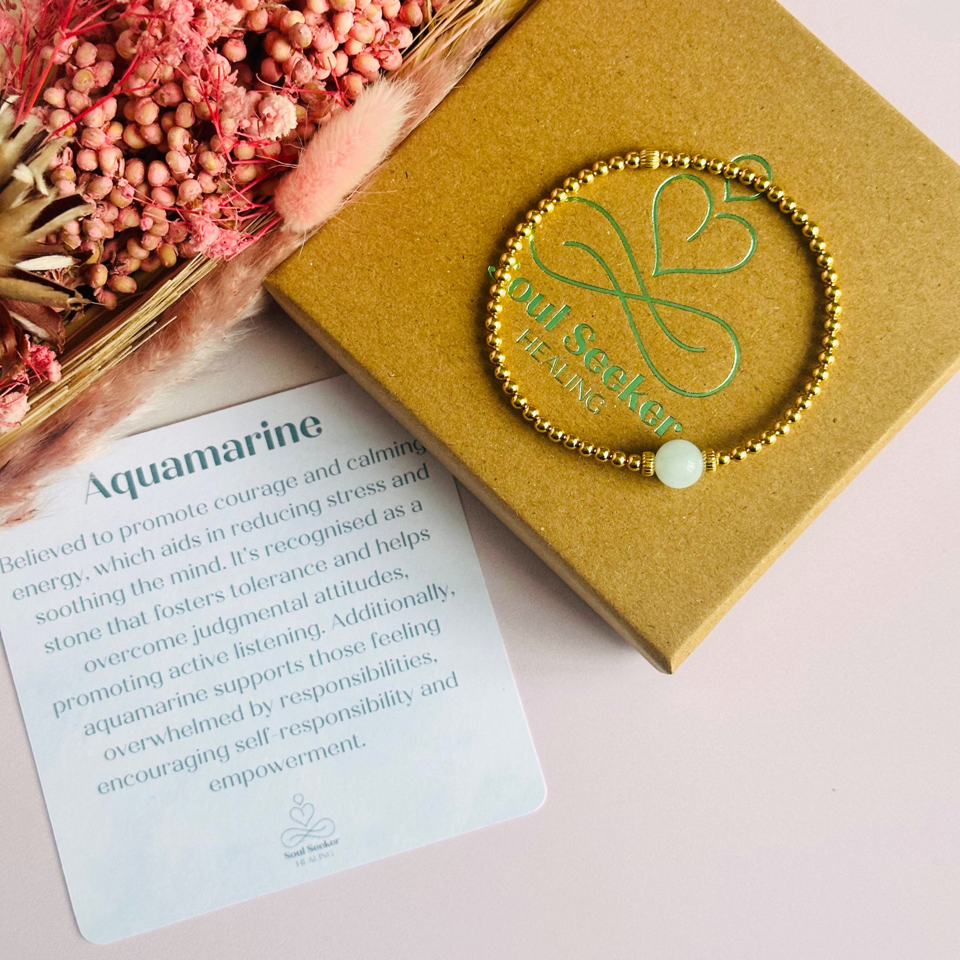 Gold vermeil aquamarine bracelet features an ethically mined 8mm aquamarine bead, flanked by corrugated rondelle beads on a band of 3mm gold vermeil beads. A bracelet to promote courage and self expression.