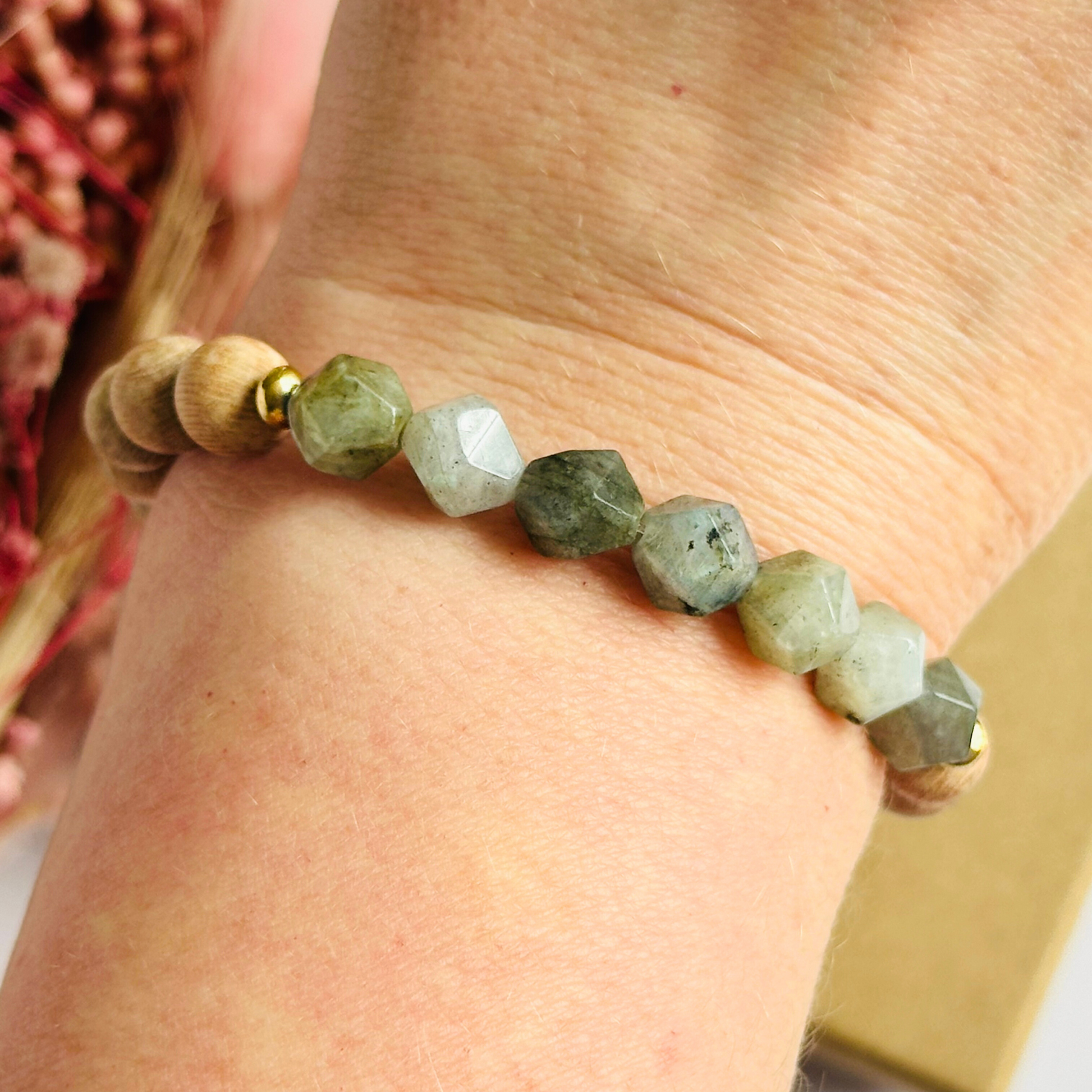 Labradorite and raw rosewood elasticated essential oil diffuser bracelet. Made with 8mm star cut labradorite beads, 8mm round raw rosewood beads and your choice of sterling silver, gold vermeil or rose gold vermeil spacer beads