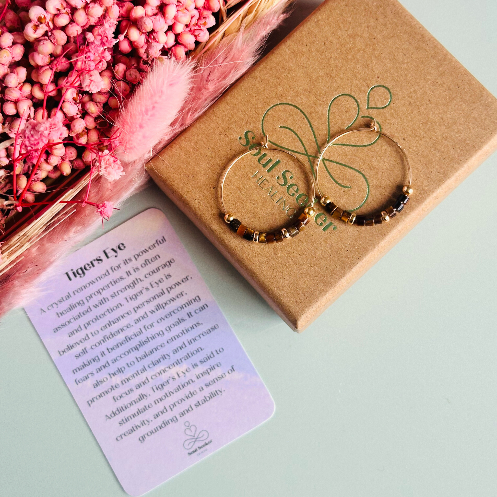 Tigers eye gold filled hoop earrings with ethically mined tigers eye heishi beads on 25mm gold filled hoops.