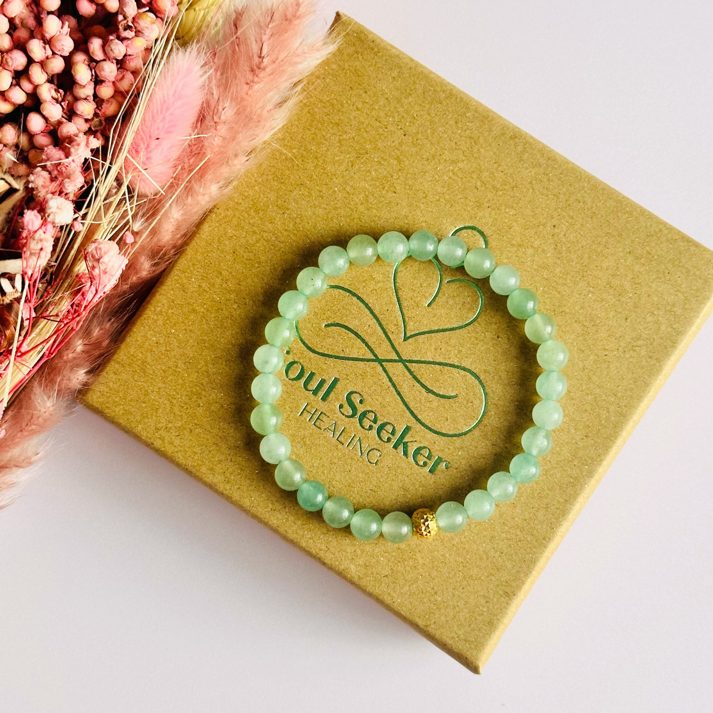 Green aventurine bracelet with a faceted gold vermeil focal bead. A bracelet for prosperity, empathy, abundance and harmony. Made with 6mm beads.