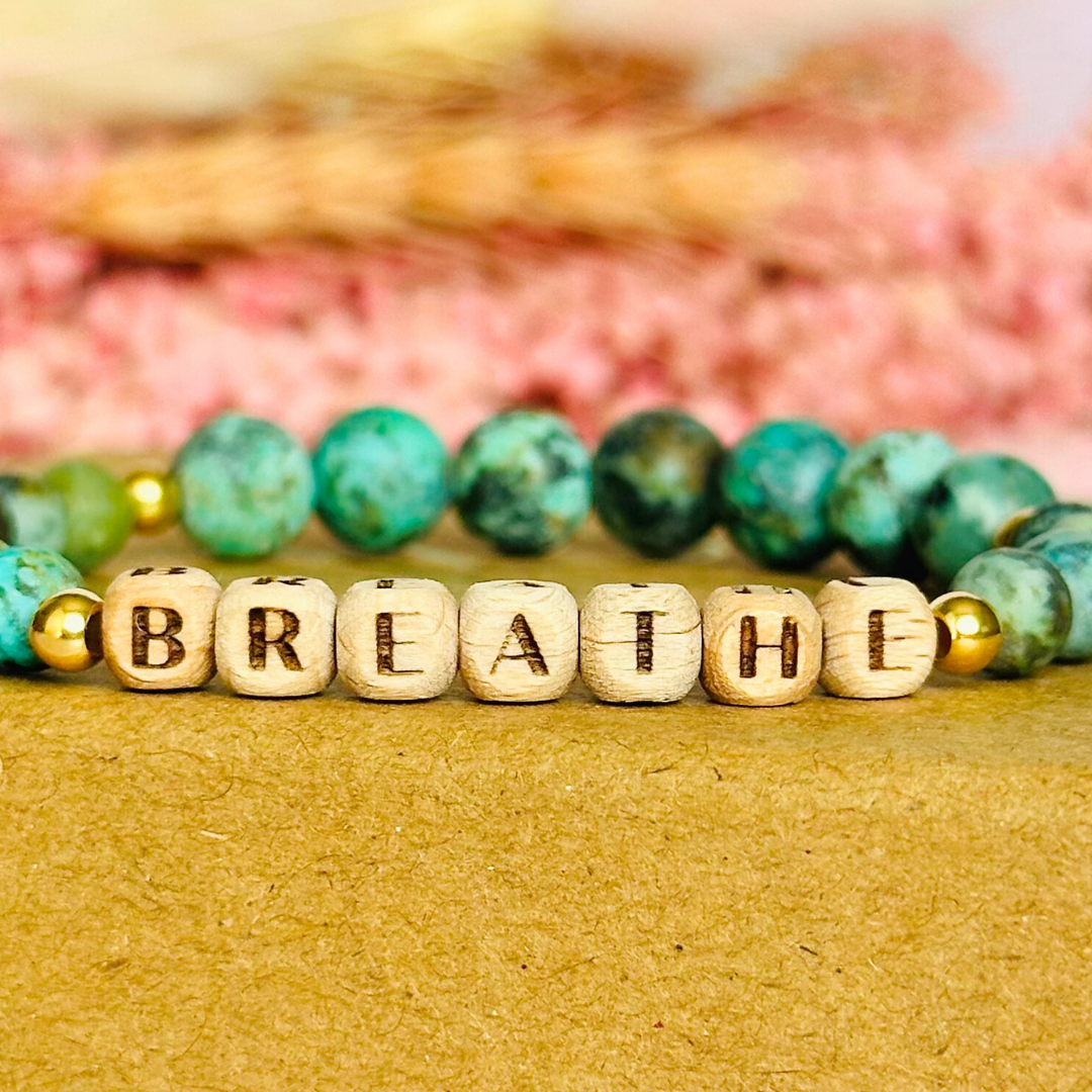 Breathwork bracelet featuring 6mm and 8mm frosted African turquoise crystal beads that follow the 4-7-8 counted breathing method. Also featuring laser engraved wooden letter beads spelling out the word BREATHE. Choose your accent beads from rose gold vermeil, gold vermeil or sterling silver.