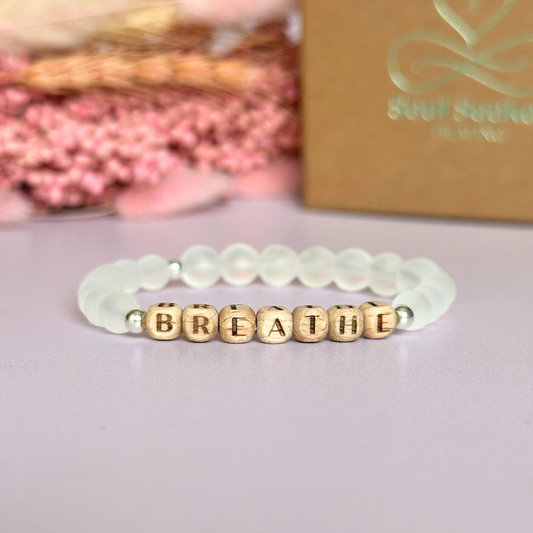 Breathwork bracelet featuring 6mm and 8mm frosted clear quartz crystal beads that follow the 4-7-8 counted breathing method. Also featuring laser engraved wooden letter beads spelling out the word BREATHE. Choose your accent beads from rose gold vermeil, gold vermeil or sterling silver.