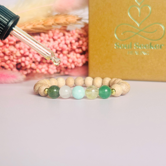 Spring crystal raw rosewood essential oil diffuser bracelet with moss agate, rose quartz, citrine, amazonite and green aventurine.