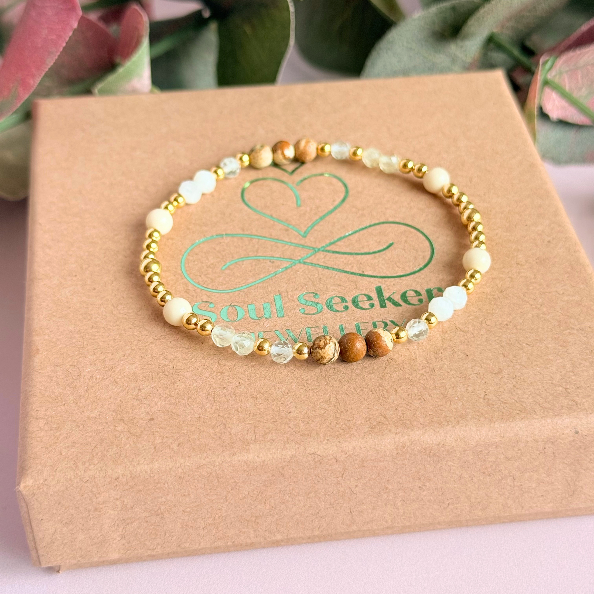 'Ibiza Bohemia' gold vermeil dainty beaded bracelet with picture jasper, river stone jasper, citrine, clear quartz and moonstone. Made with round 3mm gold vermeil beads and 4mm smooth and faceted round crystal gemstone beads. Pictured on the gift box.
